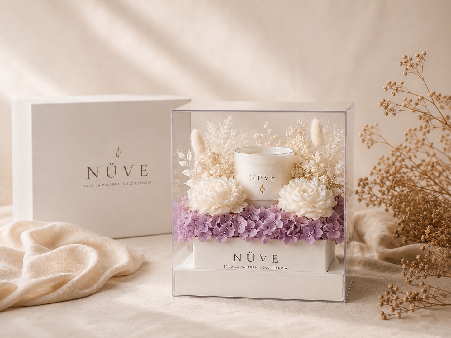 Colección Aura Nüve con vela floral y presentación botánica, fotografía 1